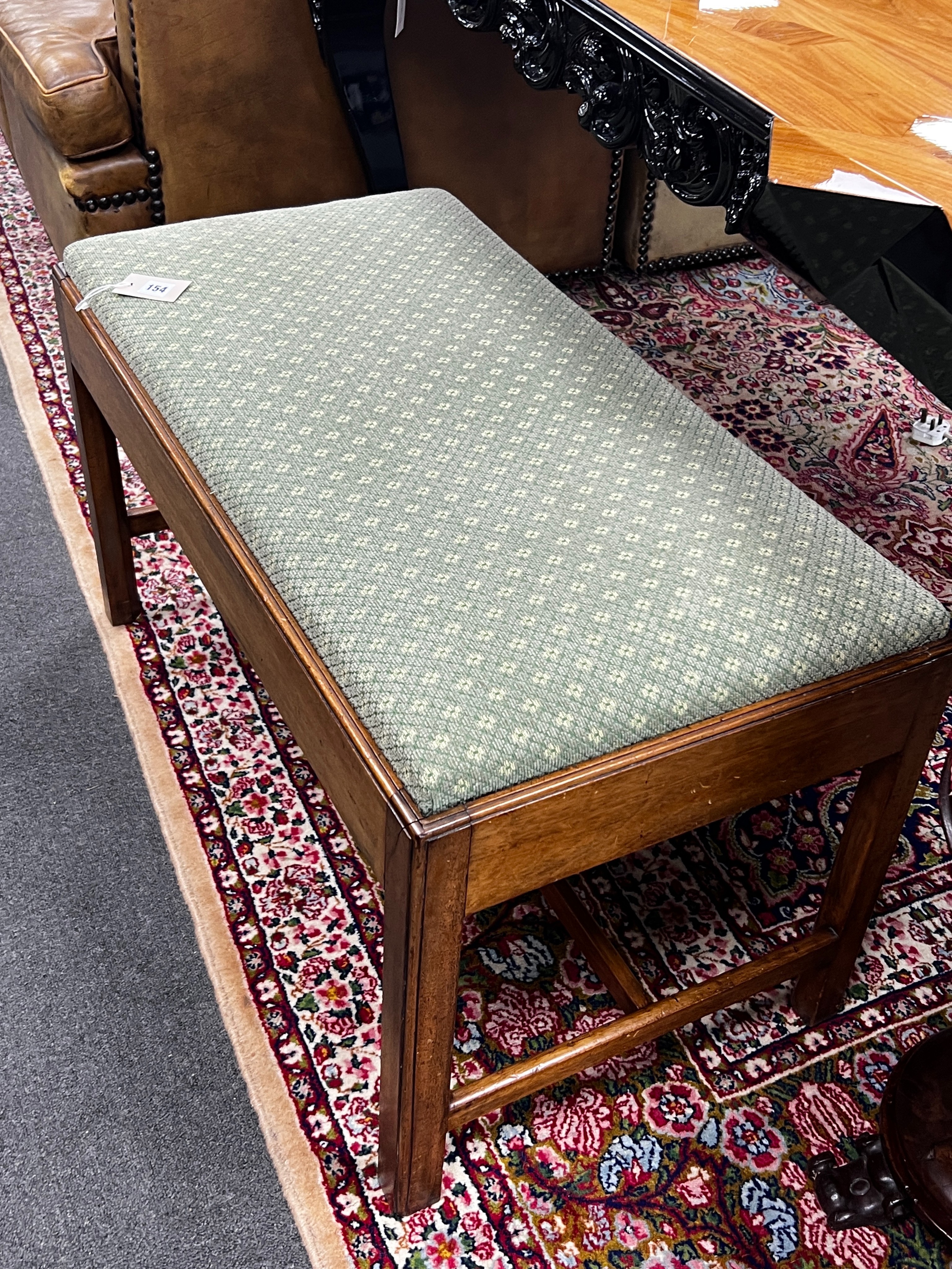 A George III style mahogany stool with upholstered drop in seat, length 90cm, depth 46cm, height 49cm